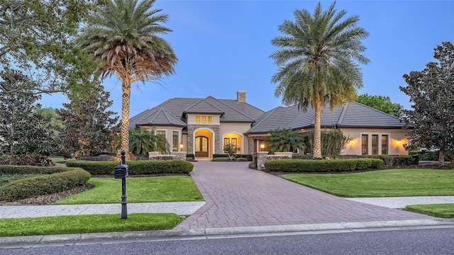 view of front of house with a front lawn