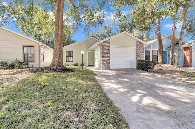 ranch-style house with a front lawn and a garage