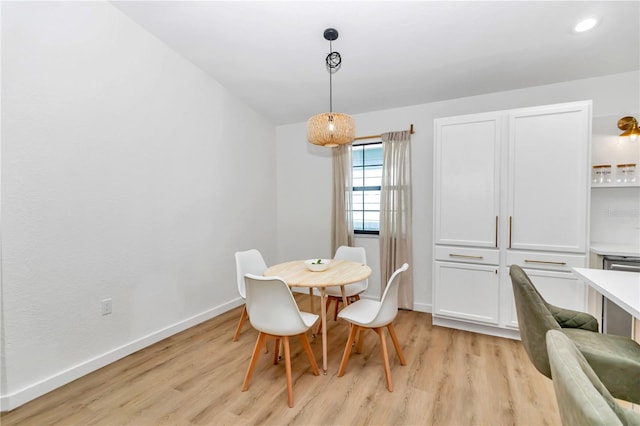 dining room with light wood-type flooring