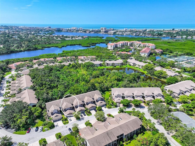 drone / aerial view featuring a water view