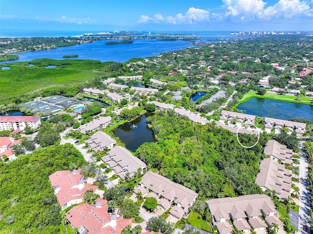 drone / aerial view with a water view