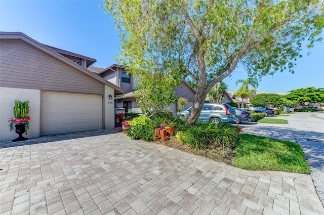 view of front of property with a garage