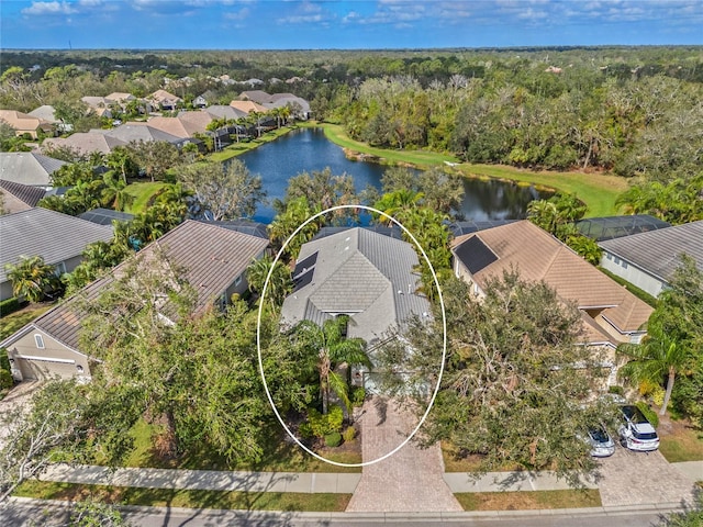 birds eye view of property featuring a water view