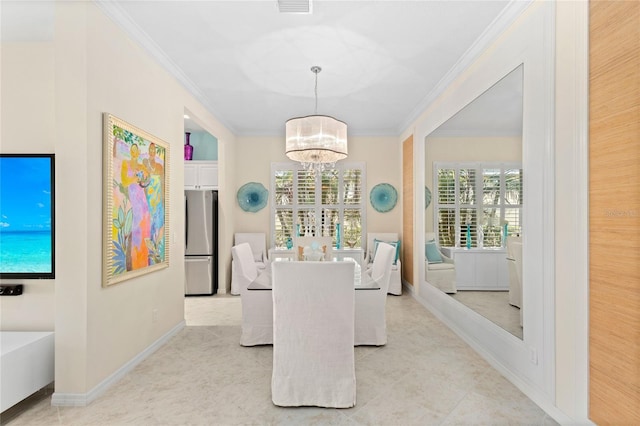 12121 Thornhill Ct, Lakewood Ranch, FL 34202 - dining room with a chandelier, crown molding, and baseboards