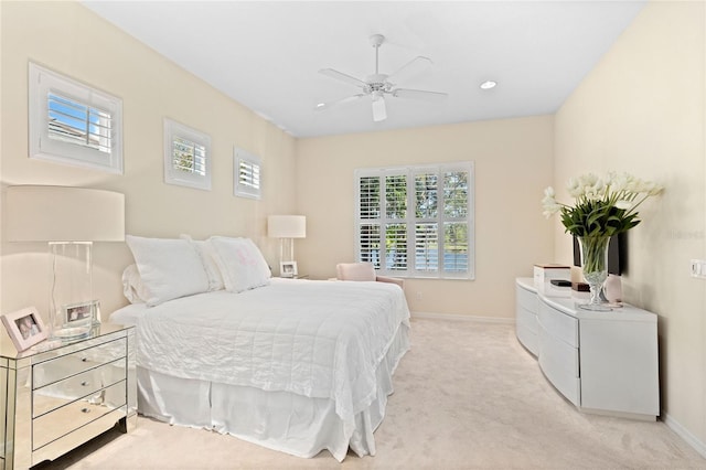12121 Thornhill Ct, Lakewood Ranch, FL 34202 - bedroom featuring light carpet, baseboards, a ceiling fan, and recessed lighting