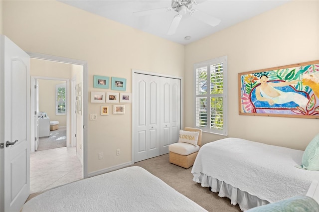 12121 Thornhill Ct, Lakewood Ranch, FL 34202 - carpeted bedroom with a closet, a ceiling fan, and baseboards