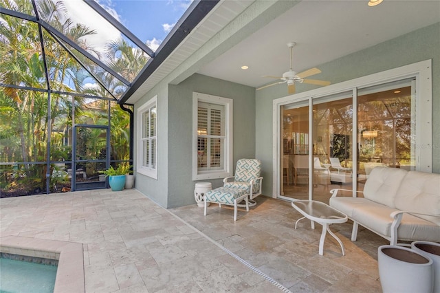12121 Thornhill Ct, Lakewood Ranch, FL 34202 - view of patio / terrace featuring a ceiling fan, glass enclosure, and an outdoor pool