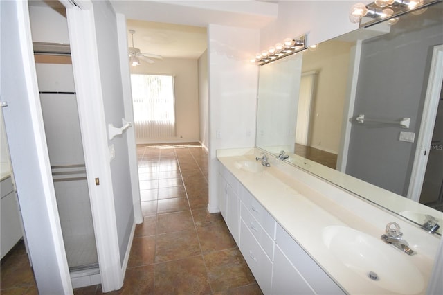 bathroom with vanity, ceiling fan, and tile patterned floors