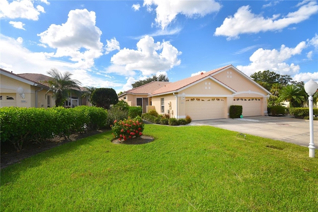 single story home with a front yard and a garage