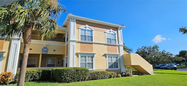 exterior space featuring a front yard