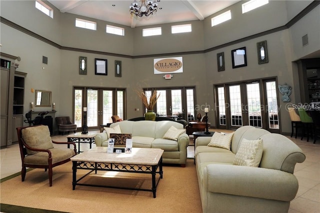 living room featuring a high ceiling, light tile patterned floors, french doors, and an inviting chandelier