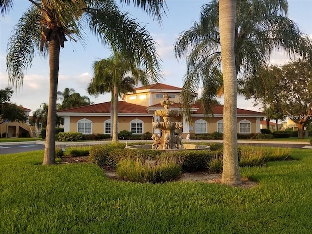 exterior space featuring a front yard