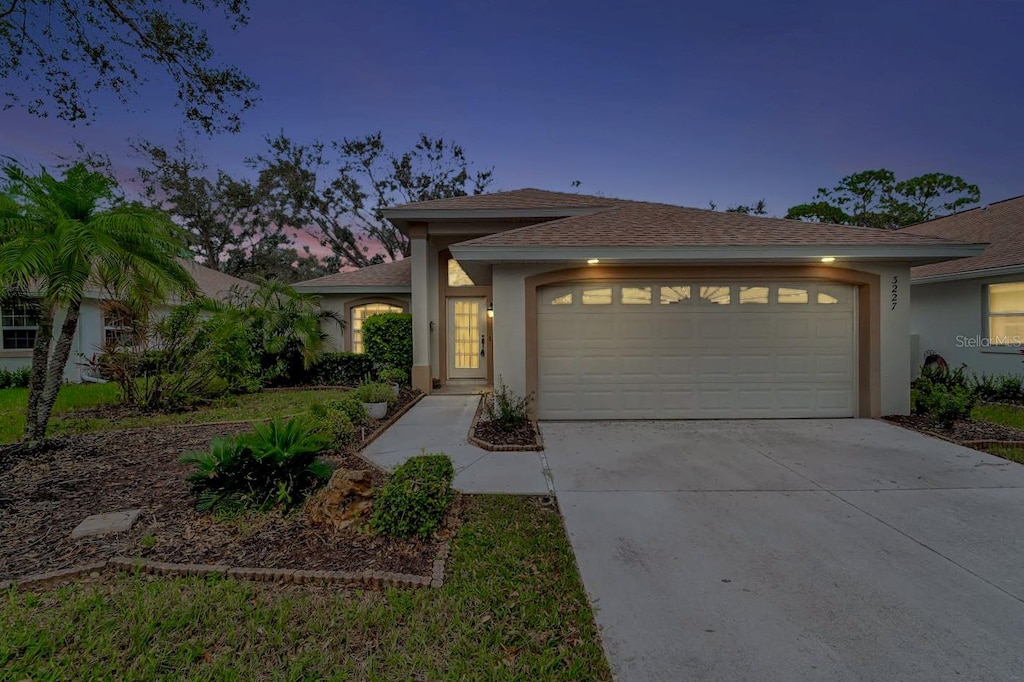 view of front of property featuring a garage