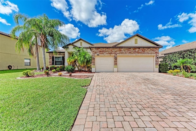 single story home featuring a front yard and a garage