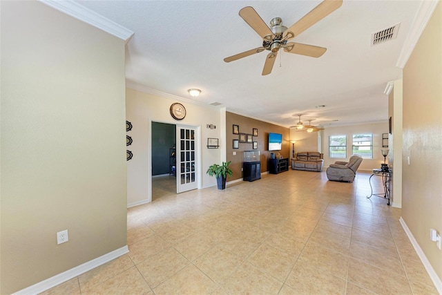 unfurnished living room with crown molding, french doors, light tile patterned floors, and ceiling fan