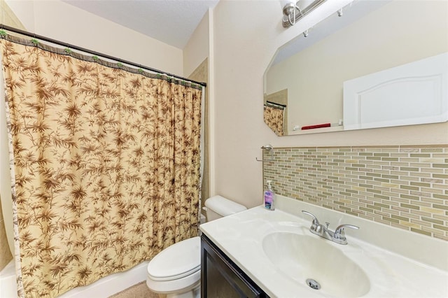 full bathroom featuring backsplash, a textured ceiling, shower / bath combo, toilet, and vanity