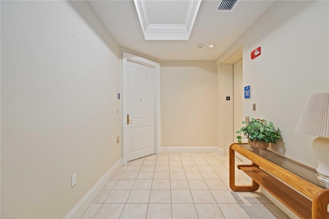 hallway featuring light tile patterned floors