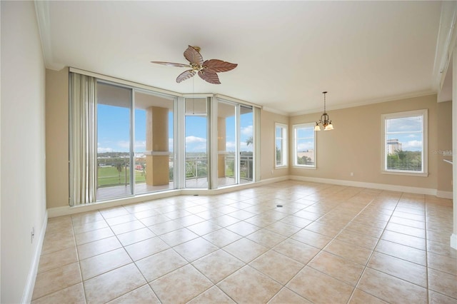 tiled empty room with ornamental molding and ceiling fan with notable chandelier