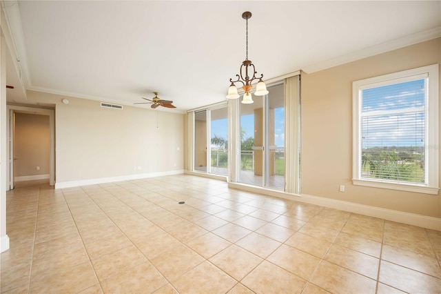 empty room with crown molding, light tile patterned flooring, and ceiling fan with notable chandelier