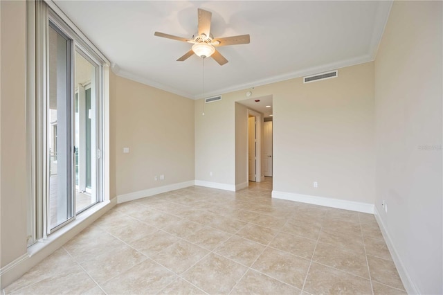 unfurnished room with crown molding, light tile patterned floors, and ceiling fan