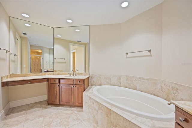 bathroom with vanity, tile patterned flooring, and plus walk in shower