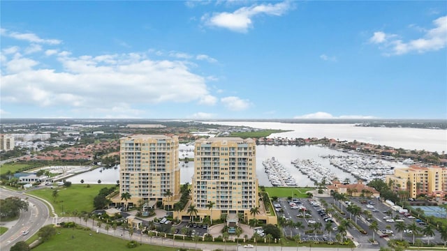 birds eye view of property with a water view