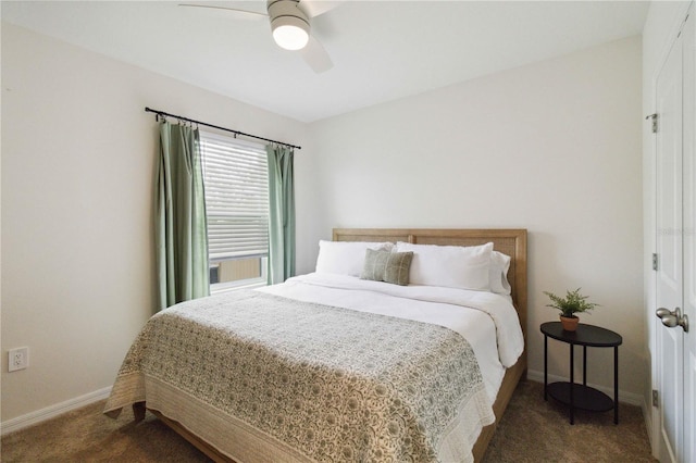 bedroom featuring dark colored carpet and ceiling fan