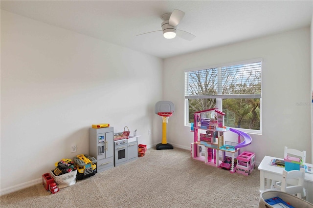 game room featuring carpet and ceiling fan