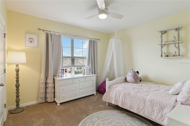 bedroom with ceiling fan and carpet floors