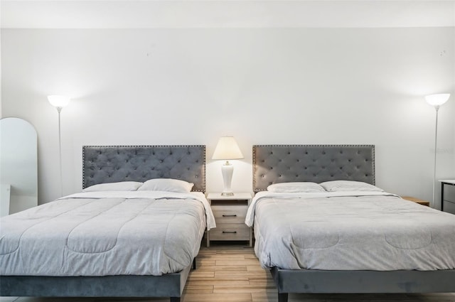 bedroom with light hardwood / wood-style floors