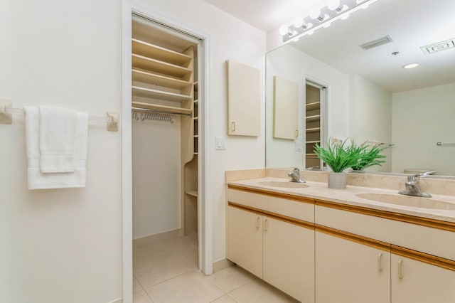 bathroom featuring vanity and tile patterned floors