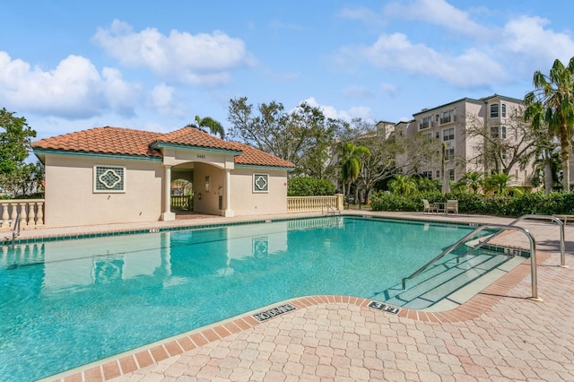 view of pool featuring a patio