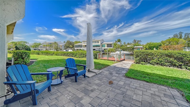 view of patio / terrace with a water view