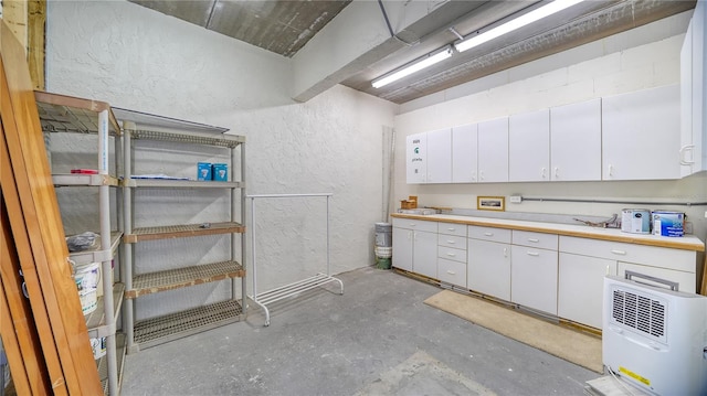 interior space with white cabinetry