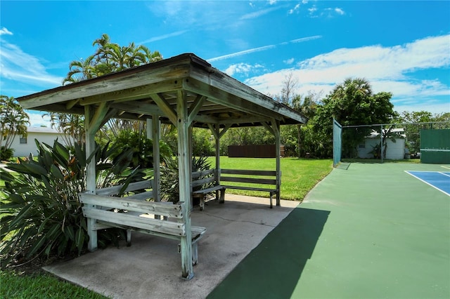 view of property's community featuring a gazebo and a lawn