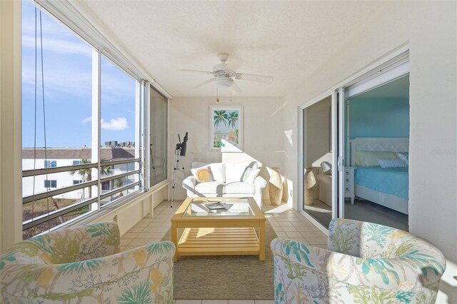 sunroom / solarium with ceiling fan