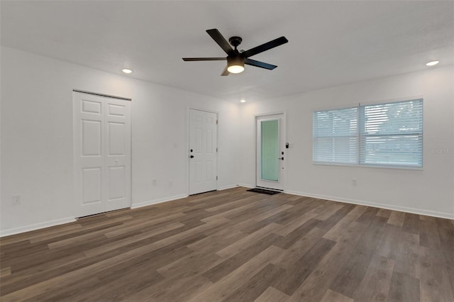 unfurnished room with wood-type flooring and ceiling fan