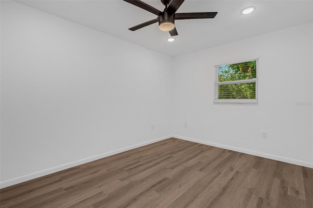 unfurnished room featuring light wood-type flooring and ceiling fan