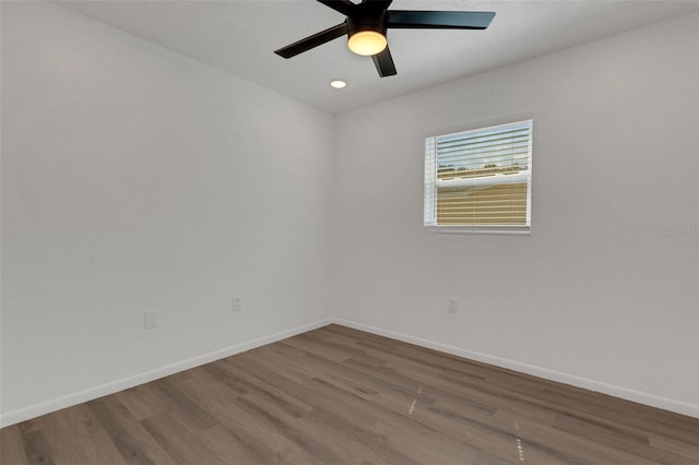 unfurnished room with wood-type flooring and ceiling fan