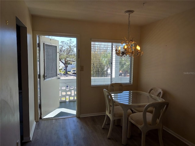 1837 Flamingo Blvd Unit O35, Bradenton, FL 34207 - dining area featuring baseboards, a chandelier, and wood finished floors