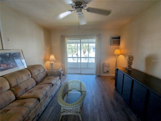 living room with ceiling fan, a wall mounted air conditioner, and dark hardwood / wood-style floors