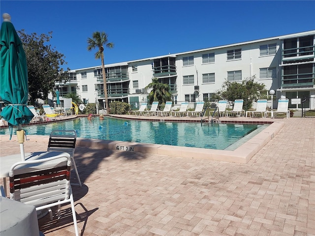 1837 Flamingo Blvd Unit O35, Bradenton, FL 34207 - community pool featuring a patio area