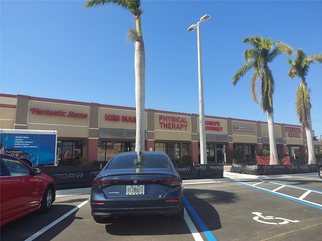 1837 Flamingo Blvd Unit O35, Bradenton, FL 34207 - view of property featuring uncovered parking