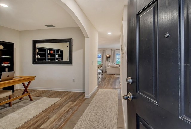 entryway with light hardwood / wood-style flooring