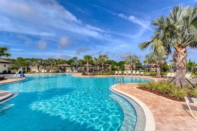 view of swimming pool featuring a patio area