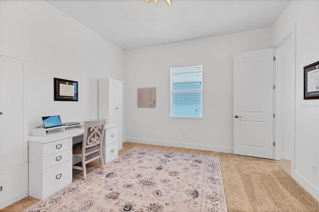 8175 Redonda Loop, Lakewood Ranch, FL 34202 - home office featuring light carpet, baseboards, and built in study area