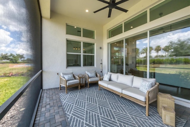 sunroom / solarium with ceiling fan