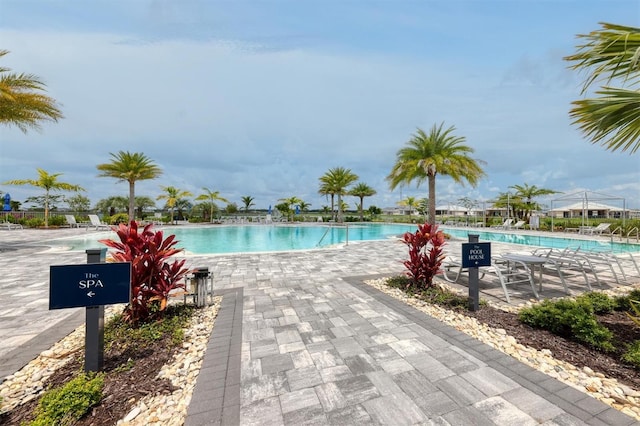 8175 Redonda Loop, Lakewood Ranch, FL 34202 - community pool featuring a patio area