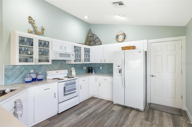 kitchen with dark hardwood / wood-style flooring, white cabinetry, and white appliances