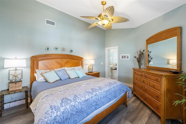 bedroom with ceiling fan and dark hardwood / wood-style flooring